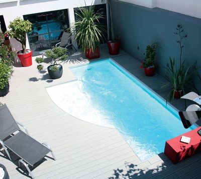 Cacher une pompe à chaleur piscine