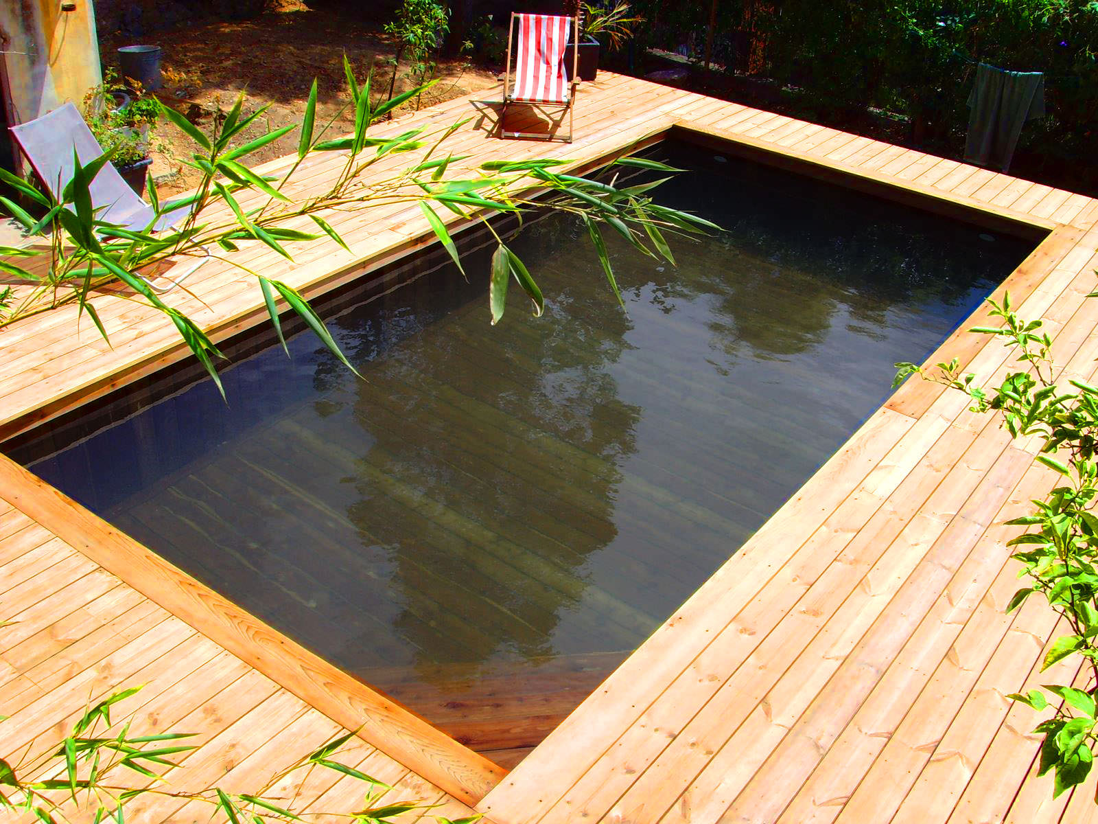Piscine bois semi enterrée avec pompe a chaleur